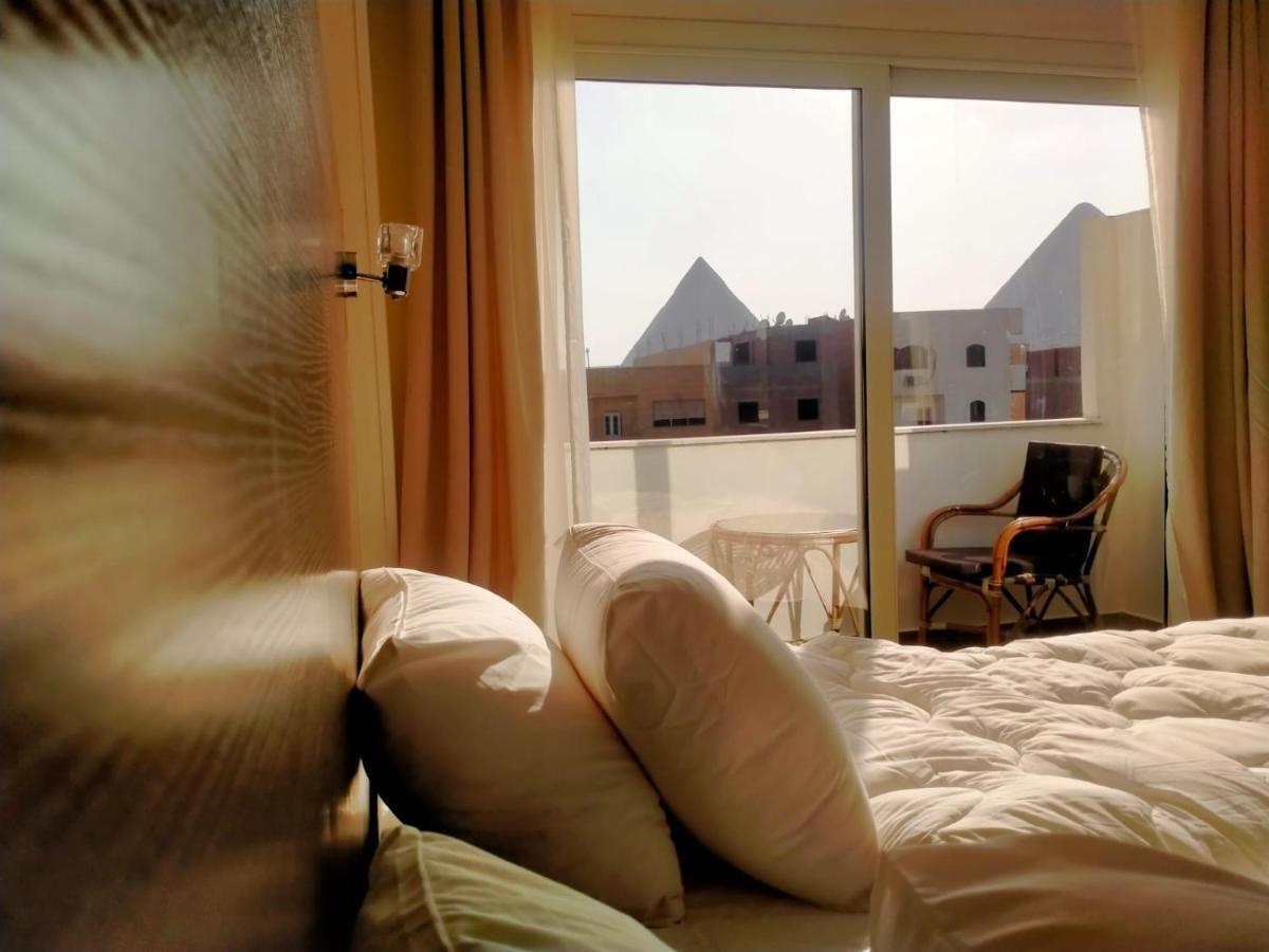 Hassan Pyramids Hotel Kafret el-Gabal Extérieur photo